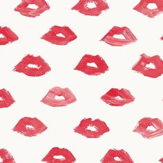 lipstick kisses drawn on white paper with red and pink paint streaks in the middle, all over