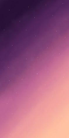 the sky is purple and pink with stars