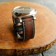 This Panerai Watch Band is made from premium cowhide leather which is done by hand on every single stages ,with traditional way to create strap. Include Buckle ( available Silver or Black color ) Strap : Material : Genuine Premium Leather, The Patina will develop in the leather during wearing time The leather is soft and very comfortable, no need break in period. Stitching and edge color can be changed on request. Thickness : For Panerai strap around 3.5 - 4 mm Our Strap Measurement : - 110/65mm Adjustable Leather Watch With Stainless Steel Clasp, Adjustable Leather Watch Band With Stainless Steel Clasp, Silver Leather Watch Bands With Round Dial, Leather Watches With Bracelet Strap And Round Dial, Timeless Leather Watch Accessories With Stainless Steel Clasp, Leather Bracelet Strap Watch With Round Dial, Adjustable Silver Leather Watch Accessories, Leather Watches With Stainless Steel Clasp For Daily Wear, Leather Watches With Stainless Steel Clasp For Everyday Use