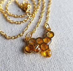 I make this necklace with resin and materials from Japan, resulting in a totally unique and exciting way to to share my love for the bees! I seriously considered becoming a beekeeper at one point... ha! The chain is a nice golden colored 304 stainless steel, and in a 20 inch length. Please keep in Handmade Honey Color Jewelry Gift, Handmade Honey-colored Jewelry For Gifts, Handmade Honey Jewelry For Gift, Honey Bee Jewelry, Hypoallergenic Necklace, Garlic Butter Shrimp, Butter Shrimp, Bee Mine, Bee Jewelry