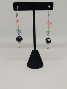 Pansexual pride star beaded mushroom earrings, LGBTQ statement jewelry, alternative fashion accessory, witchy gifts for her, summer trends These mushroom earrings are perfect for any pansexual during a pride celebration! Charms are nickel free while the fishhooks are made from sterling silver so they are safer for more sensitive ears. If you would rather have clipons or leverbacks please leave it as a note to seller! Both earrings and my workspace are properly sanitized to ensure your safety dur Pan Earrings, Gay Dangle Earrings, Pansexual Outfits, Pansexual Earrings, Lgbtq Earrings, Pansexual Pride, Summer Trends, Alternative Fashion, Statement Jewelry