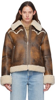 Faux-leather jacket. Distressing and faux-shearling trim throughout. · Spread collar · Two-way zip closure · Raw edge at front and back yoke · Zip pockets · Locker loop at interior · Faux-shearling lining Supplier color: Brown/Natural Shearling Jacket Women, Stand Studio, Faux Shearling Jacket, Aviator Jacket, Leather Outerwear, Trim Jacket, Aviator Jackets, Coat Stands, Double Breasted Jacket