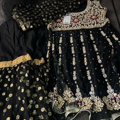 Selling Black Colored Pakistani Outfit. Includes A Beautiful Hand Beaded Dress With Embroidered Touches With Glittery Pants And Dupatta. The Dupatta (A Shawl-Like Scarf) Has A Gold Glittery Polkadot Pattern. Beautiful Black Pants With The Lower Part Having The Same Pattern As The Dupatta. Very Glittery And Great For A Party. It Is In New Condition With Tags. Never Worn. B&B Classic Fashion. Designer Bano Measurements Are Bust: 17 In Waist: 17 In Hip: 20 In Length: 34 In Black Sets For Evening Eid Celebration, Black Evening Sets For Eid, Black Sets With Dabka Work For Celebration, Black Celebration Sets With Dabka Work, Black Embroidered Evening Sets, Traditional Black Fitted Dress, Traditional Black Evening Dress, Festive Black Sequined Dress, Traditional Black Party Dress