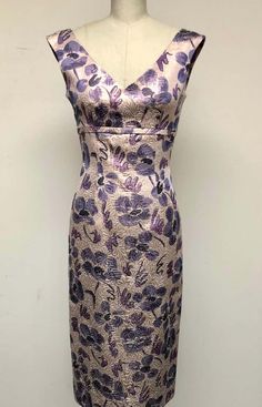 For Sale on 1stDibs - Dreamy, magical, floral for purple lovers! Whimsically abstract on a textured rose gold ground—a unique combination—this v neck high waisted slim dress Fitted Mauve Floral Print Dress, Elegant Purple Floral Print Dress, Floral V Neck Dress, Sleeve Bolero, Slim Dress, Bolero Jacket, Slim Dresses, Matching Dresses, Abstract Floral