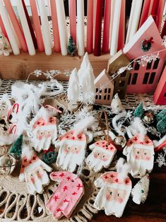 some christmas decorations and candles on a table