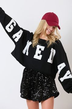 Oversized graphic varsity letter print Game Day top with oversized neckline and cropped length. Athletic Body Type, Varsity Letter, Live Fit, Bad Habit, High Rise Denim, Denim Flares, Game On, Colored Denim, Wide Leg Denim