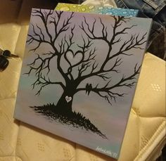 a painting of a tree with a heart on it