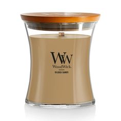 woodwick candle with wooden lid in glass container on white background, closeup view