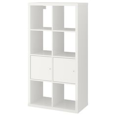 a white bookcase with four drawers on the bottom and one door open to reveal an area for storage