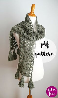 a crocheted scarf on a mannequin with text overlay that reads, free pattern