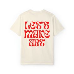 a white t - shirt with the words let's make aro printed on it