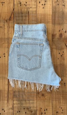 "High waisted 90's denim shorts. Made by Levi's in classic light blue denim wash. Shorts are in excellent clean condition. Perfectly worn in with light naturally distressed character. Shorts have been cut off and washed once. Measurements are taken zipped or buttoned up and laid comfortably flat then x 2 for total circumference (inches) Levis 550 Tag Size 13 100% Cotton Made in USA Waist 31.5\" Hips 43\" Length 12.5\" Inseam 2\" Rise 11.5\" leg opening circumference 25\" All items are free of ri Levis Jeans High Waisted, Levi High Waisted Shorts, Levis Mom Jeans, Shorts Levis, Levis Shorts, 90s Levis, High Waisted Denim Shorts, 90s Denim, Levis 550