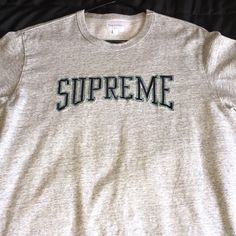 Great Condition Supreme Tee Size L Silver Crew Neck Top For Fall, Gray Tops With Embroidered Logo For Streetwear, Gray Embroidered Logo Top For Fall, Silver Cotton Tops For Streetwear, Silver Casual Top For Streetwear, Casual Silver Top For Streetwear, Gray Embroidered Logo Top For Streetwear, Silver Cotton Top For Streetwear, Silver Cotton Tops With Graphic Print