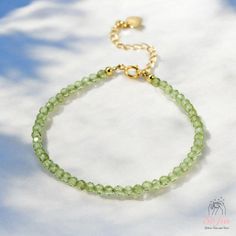 This peridot dainty bracelet is fun and easy to wear and match with any outfit. They can express your style, mood, or personality in a subtle and charming way. It is perfect for anyone who loves minimalist style, natural stones. It is a unique and meaningful gift for yourself or someone special. You can wear it by itself or mix it with other bracelets for a fun and trendy look. If you have a large demand of the stone beads or bracelets, please feel free to contact us for details. - Material : ab Elegant Green Round Beads Friendship Bracelets, Green Minimalist Round Bead Bracelets, Minimalist Green Round Beads Bracelets, Minimalist Green Round Bead Bracelets, Dainty Green Beaded Bracelets For Everyday, Adjustable Green Beaded Bracelet With Gemstone, Minimalist Green Beaded Bracelets For Friendship, Dainty Green Bracelets With Round Beads, Dainty Green Round Bead Bracelets