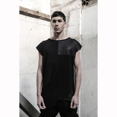 Introducing our avant-garde men's black short sleeve tee, a captivating blend of style and comfort. Crafted with soft viscose and creatively designed with two different types of georgette, this tee redefines men's streetwear. With its asymmetrical low ends, this top exudes a unique and edgy charm, making it the perfect choice for those seeking a standout fashion statement. Embrace the allure of the dark side with this extraordinary black tee that combines comfort and avant-garde design. The mode Black Techwear Tops For Summer, Summer Streetwear Techwear Tops, Futuristic Fitted Black Top, Cyberpunk Short Sleeve Tops For Streetwear, Fitted Futuristic Black Top, Cyberpunk Short Sleeve T-shirt For Streetwear, Cyberpunk Black Crew Neck Top, Cyberpunk Black T-shirt For Streetwear, Black Short Sleeve Tops For Alternative Fashion