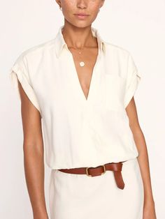 Brochu Walker - $328.00 | In a super soft, drapey, brushed Tencel fabric, our Nadel Top is the ultimate in luxe femininity-meets sporty-chic. A sensual, yet casual fixed wrap front, culminates in and elasticized front waist that has the illusion of a pre-tucked top, while a scoop shirttail, contrast back hem creates a consciously undone look. #brochuwalker #summerfashion #AD Denim Sweater Jacket, Stylist Outfit, Wrap Shorts, Tencel Fabric, Denim Sweater, Easy Breezy, Sporty Chic, Ulla Johnson, Favorite Jeans