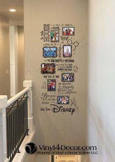 the disney family wall decals are on display in this entryway area, along with stairs and railings