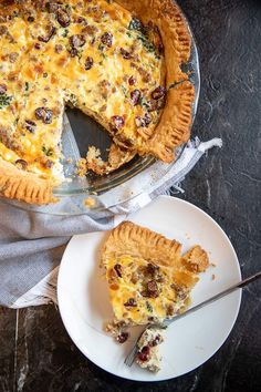 there is a pie on the table with one slice missing from it and another piece has been taken out