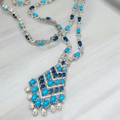 Only One In Stock. Stunning. Silver Tone Metal, Plated. Glass And Cubic Zirconias. Necklace Is 31 Inches. Blue Crystal Jewelry With Rhinestones, Blue Crystal Necklaces With Diamond Accents, Blue Crystal Necklace With Diamond Accents, Blue Crystal Jewelry With Bling, Elegant Blue Rhinestone Necklace With Sparkling Stones, Elegant Blue Crystal Rhinestone Necklace, Blue Necklaces With Sparkling Stones For Party, Blue Crystal Rhinestone Necklace For Party, Party Blue Necklaces With Sparkling Stones