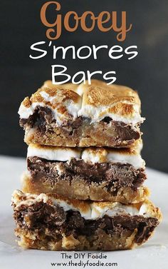 gooey s'mores bars stacked on top of each other