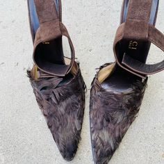 Brown Pair Of Original Gucci Sandals In Sz 10. Very Rare Pair! Heels Are Covered In Front With Delicate Brown Feathers. There Is Some Slight Wear To The Front Tips But Can Only Be Noticed When Looked At Very Closely. Heels Need New Heel Tops As The Current Ones Are Missing As Shown In Pics. Heels Have Velcro Closure Around Ankle. Heel Measures About 4.5” Feather Heels, Gucci Sandals, Shoes Gucci, Animal Prints, Gucci Shoes, Very Rare, Shoes Women Heels, Feathers, Bones