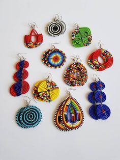 This listing is for ALL 11 pairs. The earrings are 100% handmade using original fine beads. Colorful and bright colors. ^^These earrings ships through dhl express. Buy multiple items and pay shipping for ONE item ONLY. Maasai Earrings, Popular Earrings, Wholesale Earrings, African Earrings, Minimalist Studs, Women Earrings, Maasai, Women Diy, African Beads