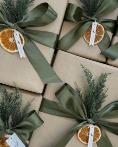 wrapped presents with orange slices and green ribbons