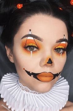 Find a collection of the best Halloween makeup ideas for those that want to achieve pretty Halloween makeup, not gory looks, such as this Elegant Clown Halloween Makeup | Pair these looks with any Halloween costumes for a seriously impressive outfit. There is something for everyone on this board: pretty Skeleton Halloween makeup, gorgeous Halloween makeup, princess Halloween makeup, mermaid Halloween makeup Inspo. #halloweenmakeup #prettyhalloween #halloweencostumes #halloweenmakeuppretty #hallo Candy Corn Makeup Ideas, Clown Hair And Makeup, Halloween Candy Makeup, Candy Corn Halloween Makeup, Candy Corn Makeup Halloween, Candy Clown Costume, Candy Corn Makeup Look, Candy Halloween Makeup, Diy Candy Corn Costume