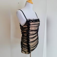 Excellent Condition. Never Worn. Black Mesh Overlay With Nude Lining. Black Ruffles Front And Back And Down One Side. Adjustable Straps. Measures 16" Pit To Pit And 25" In Length From Top Of Straps Down To Hemline. Very Sexy. Medium. By Boston Proper Chic Ruched Tank Top For Night Out, Ruched Tank Top For Night Out, Sleeveless Top With Ruched Sides For Night Out, Black Ruched Tank Top For Party, Chic Black Ruched Tank Top, Black Ruched Cami Top, Sleeveless Ruched Top For Date Night, Black Ruched Sleeveless Top, Black Sleeveless Ruched Top