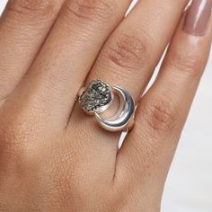 "Raw Pyrite Ring, 925 Sterling Silver Ring, Half Moon Ring, Rough Gemstone Ring, Woman Silver Jewelry, Handmade Ring, Birthday Gift For Her Gemstone Name - Raw Pyrite Stone Quality - AAA Ring Weight - 4.69 gm Ring Length - 1.4 cm  Ring Width - 1.9 cm  Stone Shape - As shown in the picture Ring Size - All Ring Size Available  You'll get the exact product as shown in the pictures We serve complete 925 sterling silver Jewelry and genuine properties of the stone. The products are dispatched from the Silver Crescent Gemstone Ring, Crescent Silver Gemstone Ring, Sterling Silver Rings With Moon Phase For Anniversary, Crescent Silver Ring With Gemstone, Silver Rings With Raw Stone, Silver Rings With Raw Stone For Promise, Sterling Silver Rings With Raw Stone, Silver Raw Stone Ring For Anniversary, Silver Raw Stone Anniversary Ring