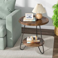 a living room with a blue couch and coffee table