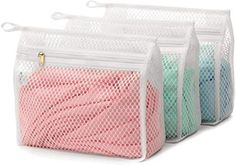 three mesh bags filled with different colored items