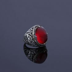 Men's red Ruby statement ring which will give you a head turning presence. This unique, vintage style, engraved 925 Sterling Silver ring has an exquisite design for the polished, refined, and distinguished man. Perfect for casual and formal events, it will make your friends envious as you walk into the room full of confidence and pride and command attention. Looking for a unique, one of a kind GIFT FOR HIM, groomsman gift, father's day gift, teacher day gift? Look no further. This cool gemstone Ruby Ring Designs Unique For Men, Heirloom Red Signet Ring With Polished Finish, Classic Red Engraved Jewelry, Collectible Red Engraved Ring, Red Engraved Signet Ring For Formal Occasion, Formal Red Engraved Signet Ring, Formal Red Engraved Ring With Polished Finish, Red Hallmarked Engraved Ring For Formal Occasions, Hallmarked Red Engraved Ring For Formal Occasions