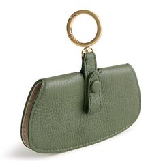 Make a statement wherever you go with our stylish sunglasses bag charm. Designed to add flair to your favorite handbag, backpack, or tote, this charming accessory is a must-have for fashion-forward individuals. Not just a stylish accessory, our bag charm also serves a practical purpose. Simply clip it onto your bag and keep your sunglasses close at hand whenever you need them. No more digging through your bag to find your shades - with our charm, they're always within reach. Vera Bradley Sunglas Rectangular Travel Bag With Keychain, Elegant Rectangular Bag Charm, Rectangular Bag With Key Clip For Daily Use, Leather Bag Charm With Interior Key Chain For Travel, Travel Bags With Key Clip, Versatile Everyday Bag With Key Leash, Rectangular Key Leash Bag Charm For Everyday, Trendy Travel Bag Charm Keychain, Trendy Bag Charm Keychain For Everyday Use