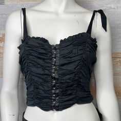 Urban Outfitters Cropped Blouse Black Size Medium Brand New Without Tags. Never Worn. Excellent Condition, No Flaws Beautiful Top With Stretch In The Back, Ties At Strap, And Featuring Hook And Eye In The Front. 97% Viscose 3% Elastane Bust 35” Length 16” Gothic Cotton Tops For Spring, Black Ruffled Crop Top, Black Ruffled Top For Alternative Fashion, Fitted Gothic Top For Night Out, Black Tank Top For Alternative Spring Fashion, Black Gothic Tank Top For Spring, Black Fitted Crop Top For Summer, Gothic Cropped Top For Party, Fitted Black Crop Top For Summer