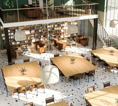 an overhead view of a library with tables, chairs and bookshelves in it