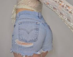 "Classic Blue Jean Baby, Highly coveted vintage 505 light to medium wash, cutoff & distressed Levi's jean shorts. These are a staple of every retro babe, who loves their levis! Mid rise, ultra short shorts and a booty hugging fit! The essence of vintage Levis is encapsulated in these perfect beauties. Literally can be styled so many ways and worn for years to come. Create new memories in these nostalgic loves of the past. Every fashionable babe needs a classic pair of Levi's jeans in their w Levi Jean Shorts, New Memories, Levi's 505, Metallic Skirt, Y2k Black, Short Shorts, Blue Jean, Classic Blue, Levi's Jeans