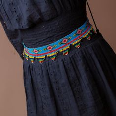 "Gorgeous leather beaded waist belt for women. Fully handmade by women artisans. Beautiful art piece made of un-dyed full grain leather and Slovakian glass beads. Give a western touch to any outfits! You can put this belt on a tunic, a maxi dress, some jeans or any outfit you wish to accessorize it with. Perfect to make an outfit tighter at the waist in order to give you an \"hourglass shape figure\". This waist belt doesn't have a buckle, you have to tie it up at the waist like you would do for Bohemian Adjustable Belt For Festivals, Adjustable Bohemian Belt For Festivals, Handmade Multicolor Belt For Festivals, Handmade Multicolor Belts For Festival, Multicolor Bohemian Belt For Festivals, Western Beaded Belts, Beaded Waist Belt, Adjustable Multicolor Bohemian Belts, Adjustable Beaded Brown Belt