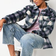 The plaid pattern and cozy texture of this women's shirt jacket from Arizona makes this button-down an easy go-to for your casual looks. Made from soft flannel, it has a point collar, long drop shoulder sleeves and chest flap pockets. Try yours layered over a graphic t-shirt with jeans.Closure Type: ButtonFit: Regular FitPockets: 2 Front Button PocketsSleeve Length: Long SleeveWarmth Factor: MidweightApparel Length: 26.5 InchesOuterwear Length: MidFiber Content: 100% PolyesterFabric Description… Cozy Texture, Junior Shirts, Plaid Shacket, Shirt Jackets, Style Shirt, Soft Flannel, Plaid Pattern, Flap Pocket, Shoulder Sleeve