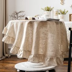 the table is covered with a beige linen