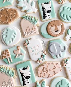 some cookies are decorated with different designs and colors