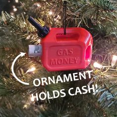 an ornament hanging from a christmas tree with the words gas money on it