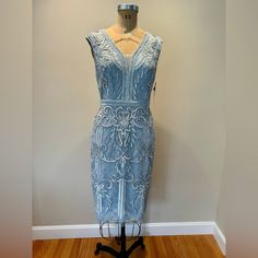 Light Blue Beaded Aidan Mattox Mother Of The Bride Dress. New With Tags, Never Worn. Size 10 But Fits Like A Size 8 Elegant Embellished Blue Midi Dress, Elegant Blue Embellished Midi Dress, Fitted Embellished Blue Midi Dress, Blue Embellished Fitted Midi Dress, Blue Embellished Midi Dress For Summer, Blue Embellished Evening Midi Dress, Blue Embellished Midi Dress For Evening, Blue Sequin Knee-length Dress, Blue Knee-length Sequin Dress