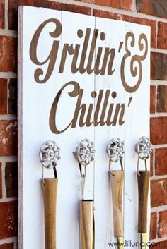 there is a sign that says grillin'and chillin'on the wall