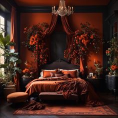 a bedroom with an orange wall and bed covered in red sheets, pillows and blankets