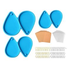 six pieces of blue plastic cutting board with scissors and other tools to cut them out