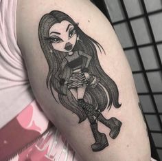 a girl with long hair and boots on her arm is depicted in this black and white tattoo