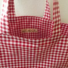 "If you wish, please join me on instagram @bethsmarketbags for coupons, updates and just good ol' eye candy! **I wish good health for everyone during this trying time! Please know that I will sanitize each item before shipment.** The base of this tote bag is 13 1/2\" X 6\"(measures about 19.5 inches across the top of the bag). The height is 11\". Handles are 22\" long end to end. 8x6 inch interior pocket with label reading \"Beth's Market Bags.\" Fully lined with coordinating oilcloth . Do not b Cotton Tote Shoulder Bag For Picnic, Spring Picnic Cotton Bag, Trendy Rectangular Shoulder Bag For Picnic, Cotton Summer Picnic Bag, Summer Cotton Bag For Picnic, Plaid Rectangular Shopping Bag, Rectangular Bags For Picnic In Spring, Cotton Picnic Bag For Summer, Trendy Rectangular Picnic Bag