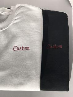 This listing is for a custom embroidered UNISEX crewneck sweatshirt. The more text you add the smaller the text will be. Interested in a different sweatshirt color, thread color, font, etc? Message us on Etsy to make a request. Please see the size chart in the product listing photos to determine the best size for you. Custom embroidered sweatshirts make a gift for any occasion - anniversary, bachelor party, bachelorette party, back to school, birthday, engagement, graduation, sweet 16's and quinceañera's, retirement, and weddings. They're also perfect for any holiday because this sweatshirt is customizable - Valentine's Day, St. Patrick's Day, Easter, Mother's Day, Father's Day, Halloween, Thanksgiving, Hanukkah, Christmas, and more. Or this could be a wonderful treat for yourself. These s Crew Neck T-shirt With Custom Embroidery, White T-shirt With Letter Embroidery As Gift, White T-shirt With Embroidered Text For Winter, Black Crew Neck Sweatshirt With Letter Embroidery, Gift Sweatshirt With Embroidered Text And Long Sleeves, Black Crew Top With Custom Embroidery, White Crew Neck Sweatshirt With Letter Embroidery, Basic Crew Neck Sweatshirt With Embroidered Text, Custom Text Cotton Sweatshirt For Streetwear