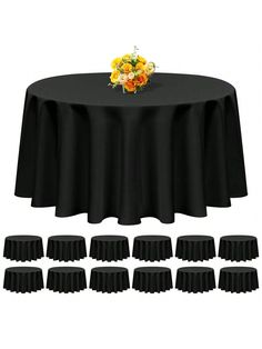 black round tablecloths with white and yellow flowers on top are arranged in rows